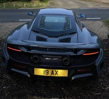 UK Number Plate 19 AX on a 2016 Grey Mclaren 675