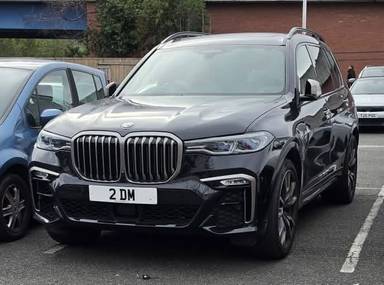 UK Number Plate 2 DM on a 2019 Black BMW X7