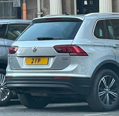 UK Number Plate 2 FP on a 2018 White Volkswagen Tiguan