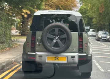 UK Number Plate 2 K on a 2020 Green Land Rover Defender Se D Auto