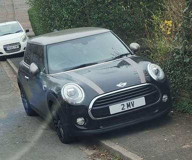 UK Number Plate 2 MV on a 2017 Black Mini Cooper S
