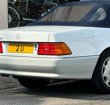UK Number Plate 2 U on a 1993 White Mercedes 600