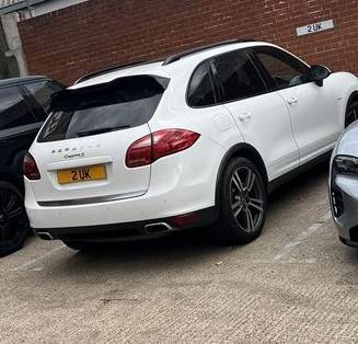 UK Number Plate 2 UK on a 2014 White Porsche Cayenne