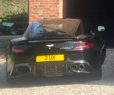UK Number Plate 2 UX on a 2018 Black Aston Martin Vanquish