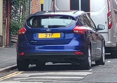 UK Number Plate 2 YF on a 2015 Blue Ford Focus