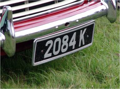 UK Number Plate 2084 K on a 1960 RED Morris Minor