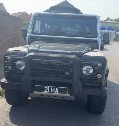 UK Number Plate 21 HA on a 2002 Black Land Rover Defender