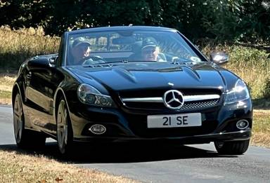 UK Number Plate 21 SE on a 2012 Black Mercedes SL