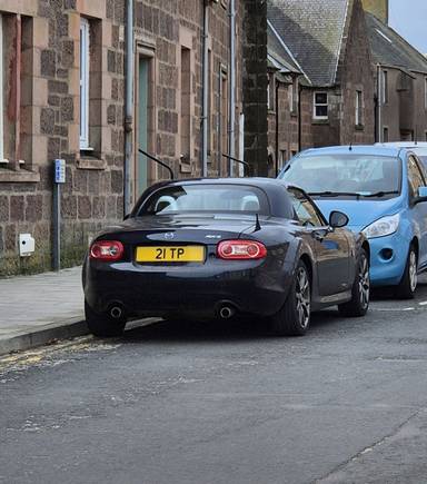 UK Number Plate 21 TP on a 2014 Blue Mazda