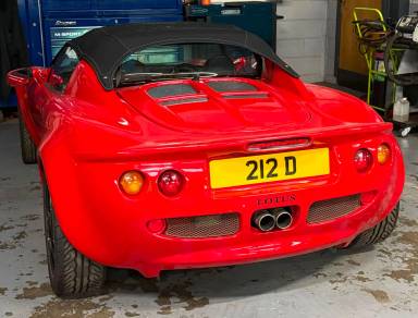UK Number Plate 212 D on a 1999 RED Lotus Elise
