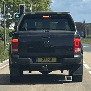 UK Number Plate 23 HW on a 2016 Black Volkswagen Amarok