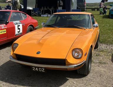 UK Number Plate 24 OZ on a 1972 Orange Datsun 240z