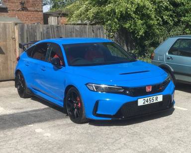 UK Number Plate 2455 R on a 2025 Blue Honda