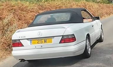 UK Number Plate 25 M on a 1996 White Mercedes E