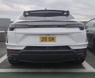 UK Number Plate 25 SM on a 2024 White Lamborghini Urus V8 Performante Auto