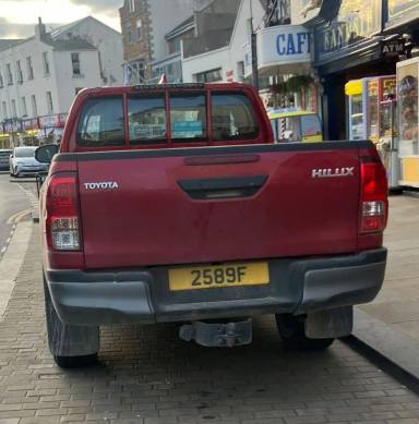UK Number Plate 2589 F on a 2023 RED Toyota Sprinter