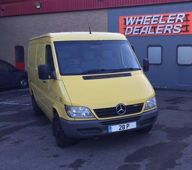 UK Number Plate 28 P on a 2002 Yellow Mercedes 200