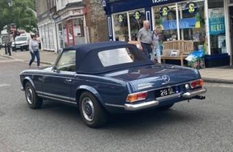 UK Number Plate 28 SL on a 1968 Blue Mercedes SL