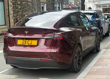 UK Number Plate 29 CJ on a 2024 RED Tesla Model Y Performance Awd