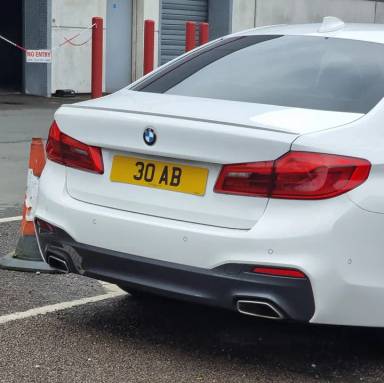 UK Number Plate 30 AB on a 2018 White BMW 5 Series