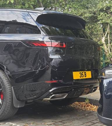 UK Number Plate 35 B on a 2026 Black Land Rover Transit