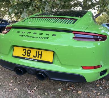 UK Number Plate 38 JH on a 2017 Green Porsche 911
