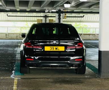 UK Number Plate 39 WL on a 2022 Black BMW M550i Xdrive Auto