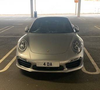 UK Number Plate 4 DA on a 2015 Silver Porsche 911