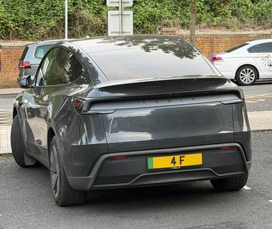 UK Number Plate 4 F on a 2025 Grey Tesla Model Y Rwd