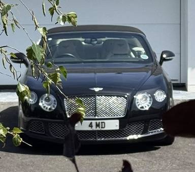 UK Number Plate 4 MD on a 2013 Black Bentley Continental