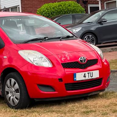 UK Number Plate 4 TU on a 2009 RED Toyota Yaris