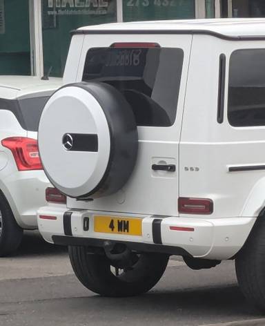 UK Number Plate 4 WM on a 2024 White Mercedes-Benz G