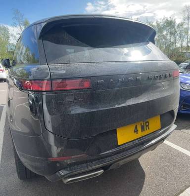 UK Number Plate 4 WR on a 2025 Black Land Rover Megane