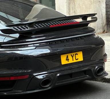 UK Number Plate 4 YC on a 2021 Black Porsche 911 Turbo S S-A