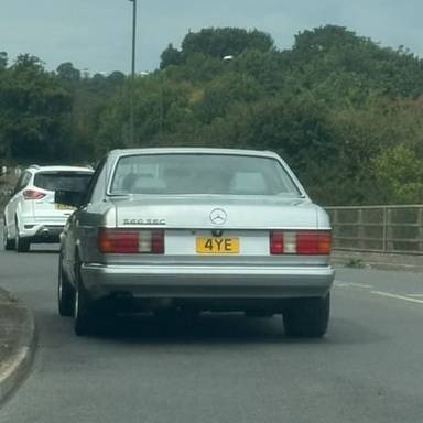 UK Number Plate 4 YE on a 1987 Silver Mercedes S-Class