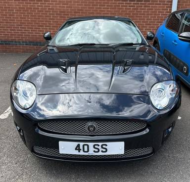UK Number Plate 40 SS on a 2008 Black Jaguar XKR