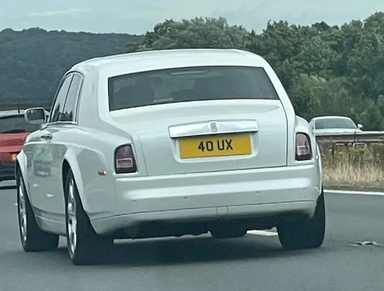 UK Number Plate 40 UX on a 2004 White Rolls Royce Phantom