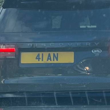 UK Number Plate 41 AN on a 2021 Black Land Rover Discovery R-Dynam Hse D Mhev A