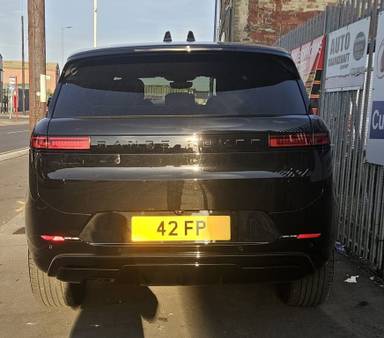 UK Number Plate 42 FP on a 2026 Black Land Rover Transit