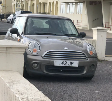 UK Number Plate 42 JP on a 2011 Silver Mini Mini
