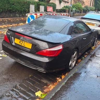 UK Number Plate 42 L on a 2015 Black Mercedes-Benz SL