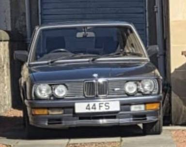 UK Number Plate 44 FS on a 1985 Blue BMW 5 Series