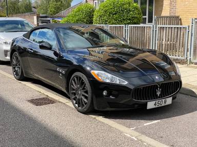 UK Number Plate 450 R on a 2010 Black Maserati Granturismo