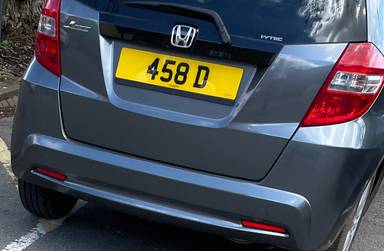 UK Number Plate 458 D on a 2012 Grey Honda Jazz