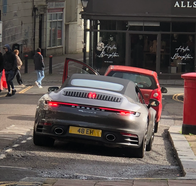 UK Number Plate 48 EH on a 2019 Grey Porsche 911