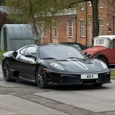 UK Number Plate 49 V on a 2009 Black Ferrari 430