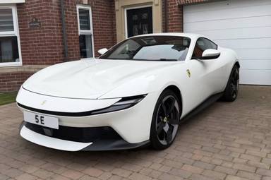 UK Number Plate 5 E on a 2026 White Ferrari Amalfi Coupe S-A