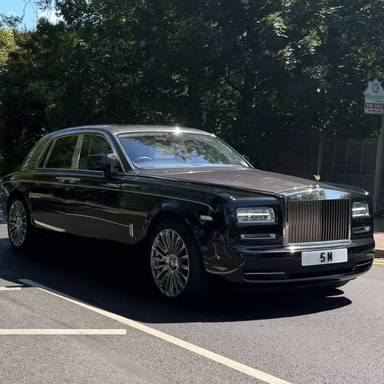 UK Number Plate 5 M on a 2014 Black Rolls Royce Phantom