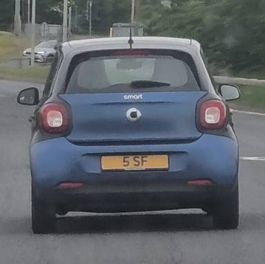 UK Number Plate 5 SF on a 2017 Black Smart Forfour