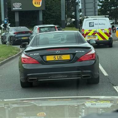 UK Number Plate 5 UE on a 2014 Black Mercedes-Benz SL